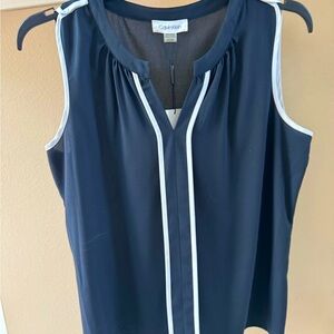 Navy Sleeveless Calvin Klein blouse with white accents